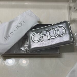 Sold Jimmy Choo Authenticated Silver Metallic Zip Wallet with Embossed CHOO Logo